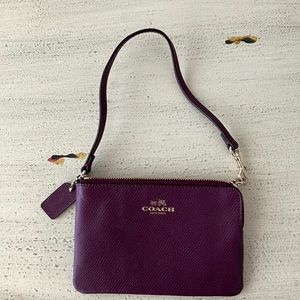 Coach purple clutch never worn no tag